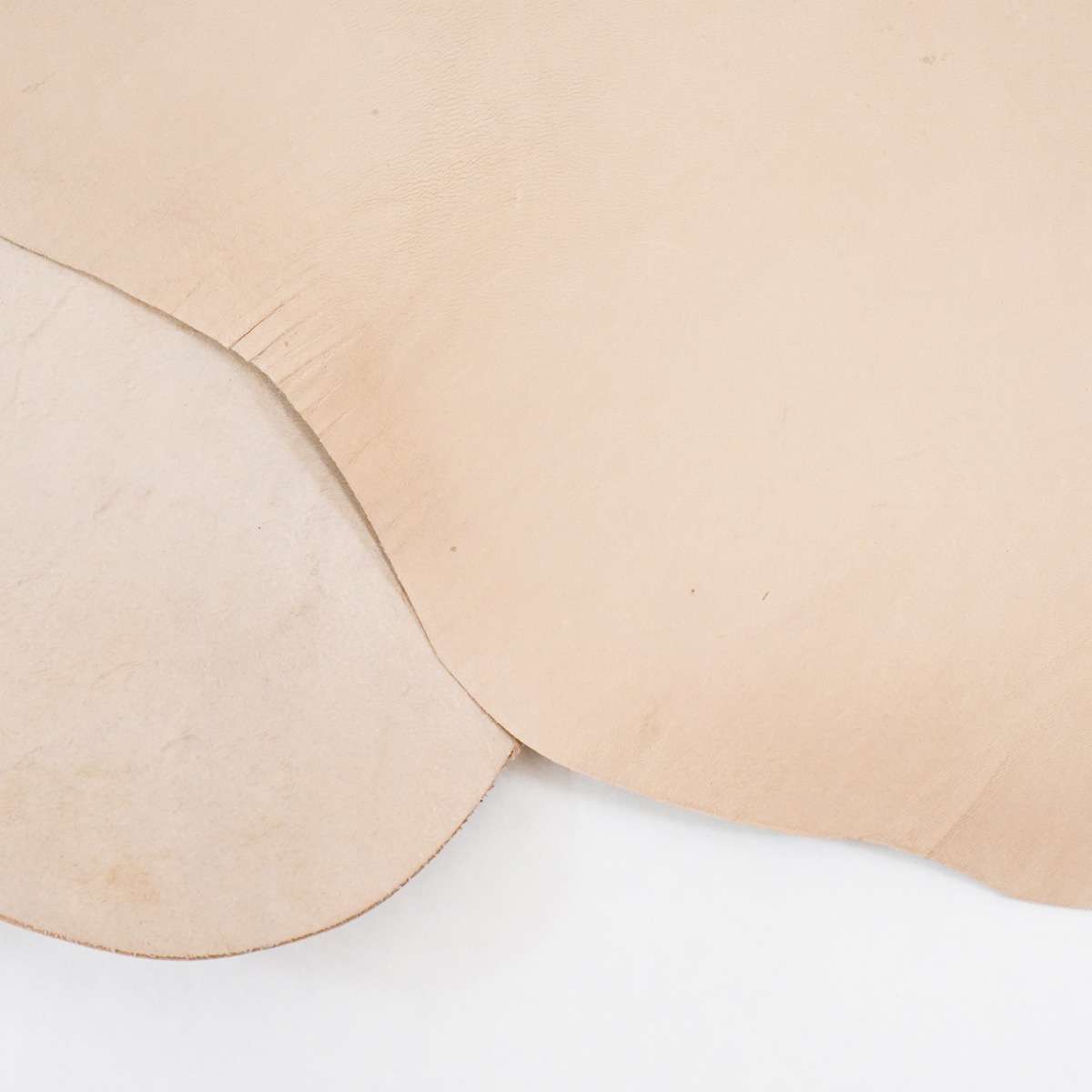 VTKS.Natural.LHG Finish.3.jpg Veg Tan Kangaroo Skins Image
